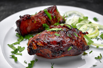Baked veal liver with herbs on a plate