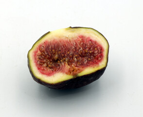 Sliced figs isolated on white background