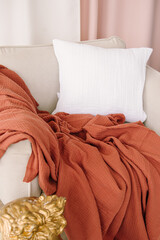 Muslin bedspread. White muslin pillowcase. Natural. Home textiles made of natural fabrics