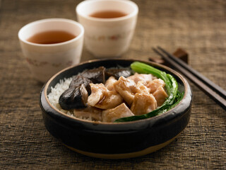 Steamed Rice with Chicken and Mushroom served in a dish isolated on table side view