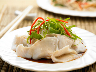 Steamed Sanyu or Steamed San yu served in a dish isolated on table side view