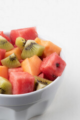 Fruit salad of watermelon, melon and kiwi.