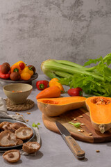Autumn vegetables arranged on a kitchen worktop