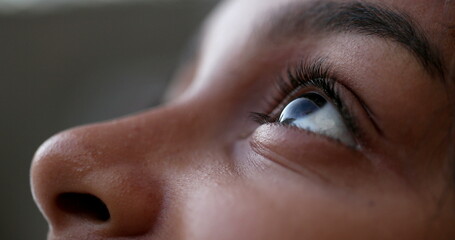 Child eyes looking up, black kid opening and closing eyes