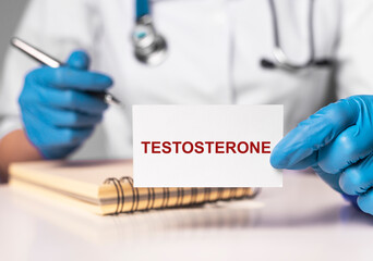 Testosterone hormone concept. Doctor sitting at table and taking notes. Urologist consulting...