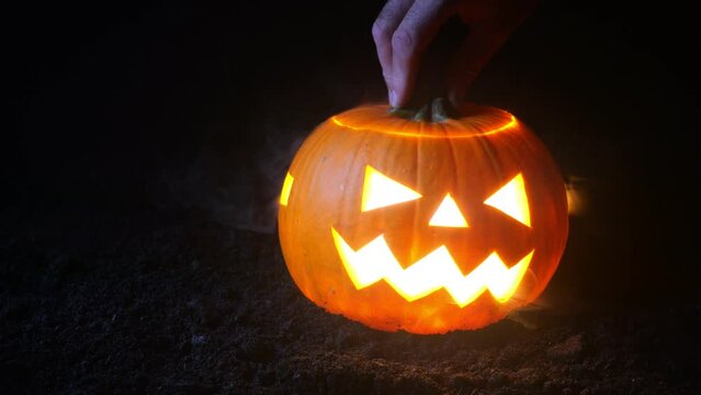 Halloween Pumpkin Skull Trepanation. Light and smoke inside.