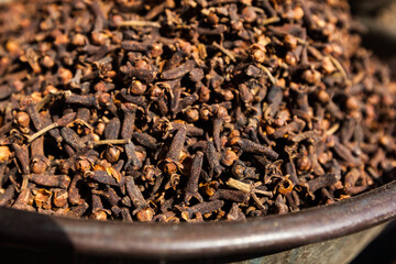 Cloves for sale at the Indian market, harmonious repetitive pattern