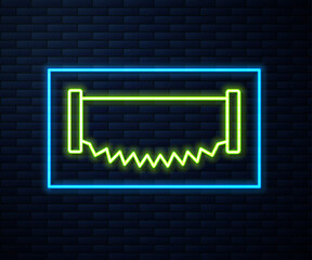 Glowing neon line Two-handed saw icon isolated on brick wall background. Vector