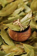 bay leaves in a wooden bowl