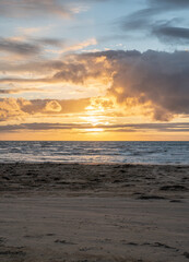 Colorful Sunset on beautiful golden sand beach in Laholm Melbystrand Sweden