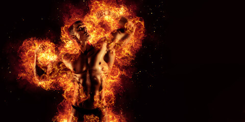 Bodybuilder posing on the fire flames background