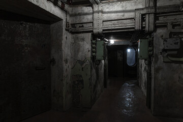 Abstract dark military bunker interior, grungy underground