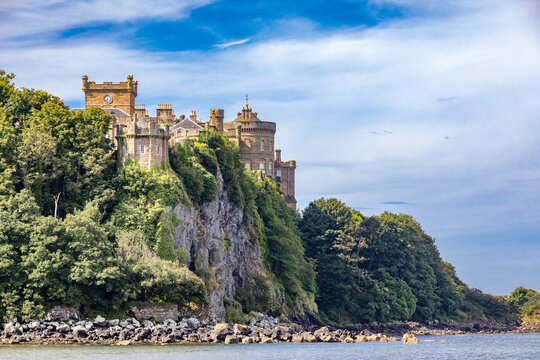 Culzean Castle in Scotland perched on a mountainside near the water