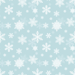 Snowflakes seamless pattern. White snowflakes on a blue background . Vector.