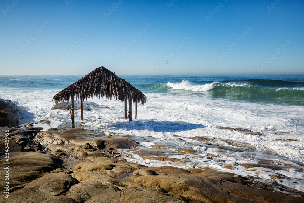 Poster USA, California, La Jolla, High surf at high tide rolls toward Windansea Surf Shack