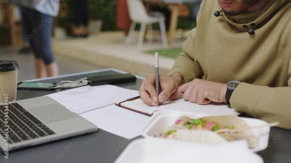 Aufkleber web design, research and creative app designer writing notes and searching on a laptop in a busy wor