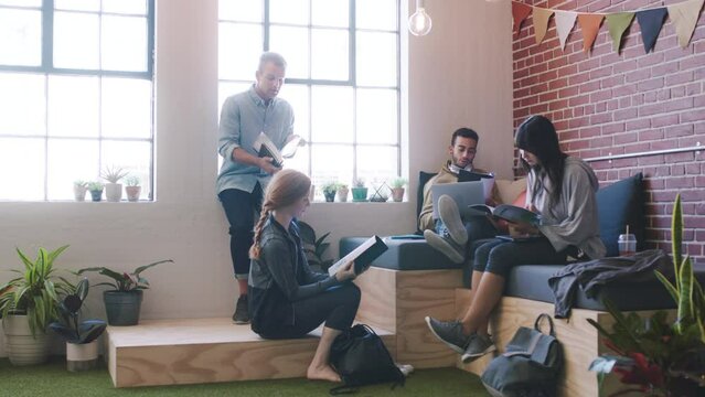 Portfolio, meeting and team with documents planning a branding, digital marketing and startup ideas. Collaboration, data and young interns reading project review paperwork and studying a summary
