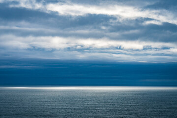 Fototapeta premium Dyrhólaey Lighthouse and the Black Sand Beach (Vik, Iceland)