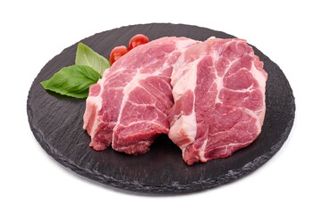 Pork shoulder steaks, isolated on white background.