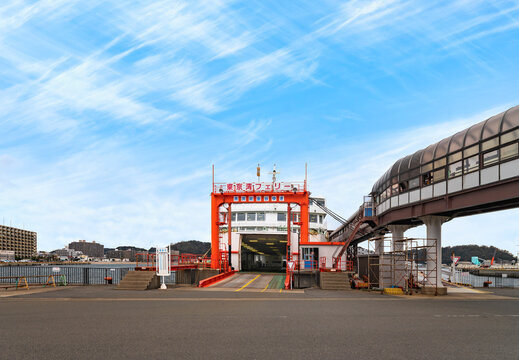 Chiba, Japan - Dec 25 2021: Back Gate With An Open Ramp Leading To The Parking Deck Of Kanaya-Maru Ferry Moored Beside The Aerial Passengers Corridor At Kurihama Terminal Leaving For Kanaya Port.