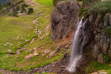 USA, Colorado, Uncompahgre National Forest. Landscape with Porphyry Falls and stream.