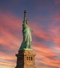 Statue of Liberty against a bright sky with clouds © SDF_QWE