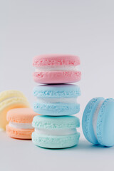 Colorful macaroons on a white background.