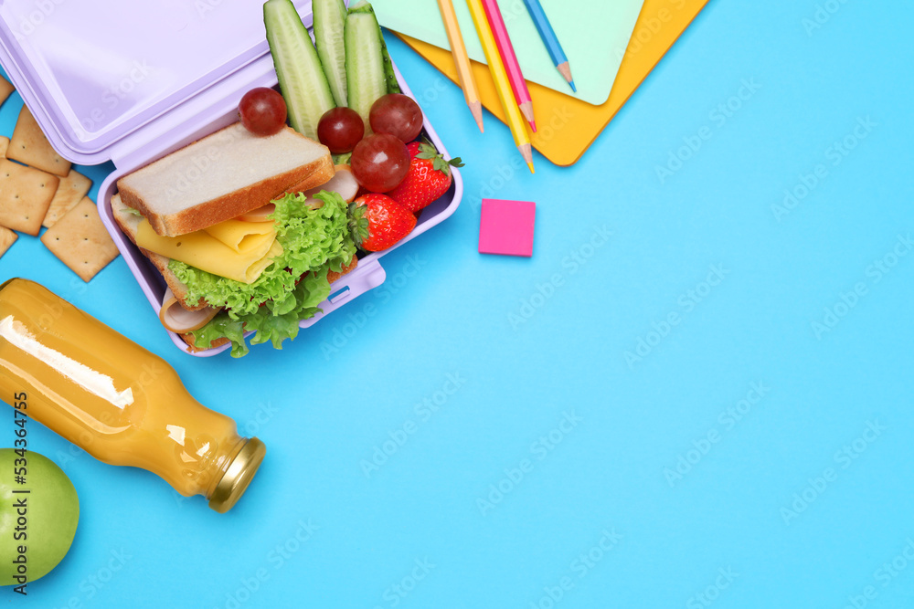 Sticker Lunchbox with tasty food, juice and school stationery on light blue background, flat lay. Space for text