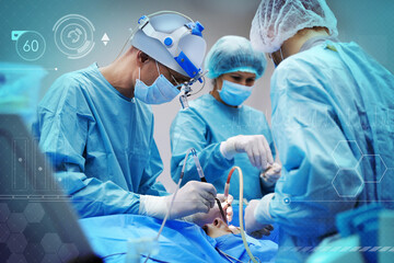 Team of professional doctors performing operation in surgery room and illustration of different virtual icons