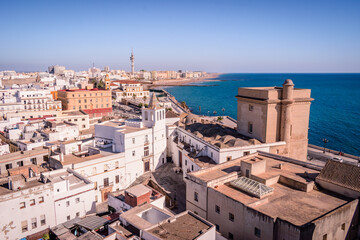 Roofs of houses and towers in aerial view in the town of Cádiz overlooking the Atlantic Ocean SPAIN
