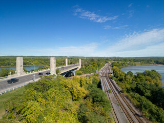 Aerial photo of McQuesten Bridge along with train tracks along the Burlington Bay coastline