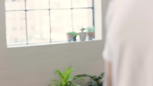 Exercise, business and working in a healthy workplace in a modern office. Busy, active and multicultural business people doing work on laptop, yoga and strategy. A lifestyle balance in company or job