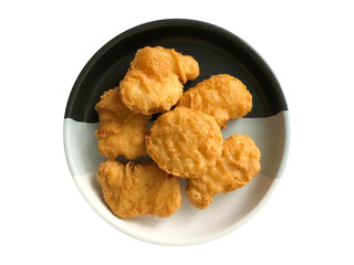Chicken nuggets on a plate isolated on white background