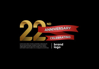 22 years anniversary logo with gold and red emblem on black background