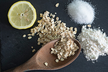 Homemade oatmeal cookies on dark background.