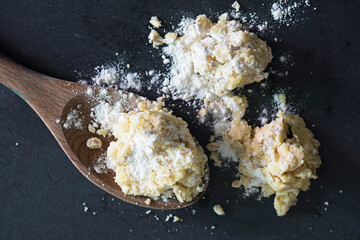 Homemade oatmeal cookies on dark background.