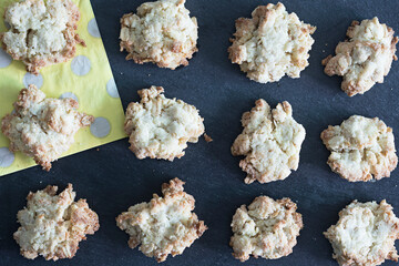 Homemade oatmeal cookies on dark background.