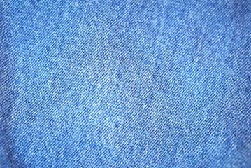 Blue denim jeans canvas fabric texture textile garment fashion background wallpaper surface...