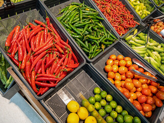 Fresh organic Vegetables and fruits on shelf in supermarket, farmers market. Healthy food market concept.