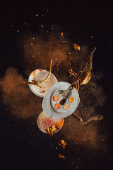 Autumn art concept, diy palettes, artist tools in an explosion of sparkles and cinnamon, cloud of...