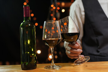 Bartender Serve wine, on wood bar, 