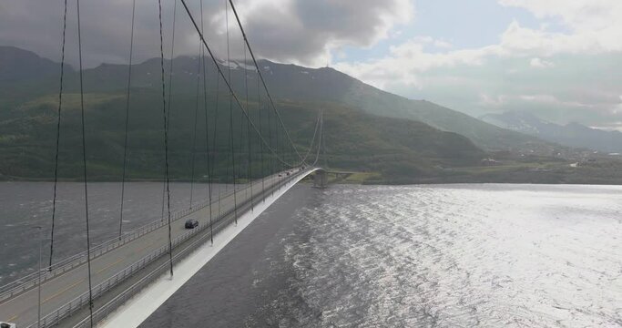 Cars traveling on cable stayed suspension Halogaland bridge in Narvik, Norway, aerial