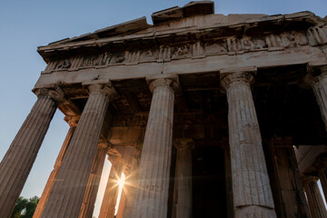 Obraz premium Temple of Hephaestus or Hephaisteion, a well-preserved ancient Greek temple dedicated to Hephaestus, standing largely intact today. It is a Doric peripteral temple, at the Agora of Athens, Greece.