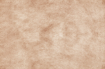 Fine sand concrete polished texture background. Pastel orange cement wall backdrop.