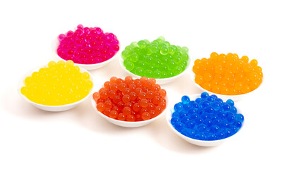 Six Different Flavors of Popping Boba Pearls on a White Background