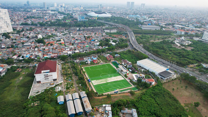 Aerial View of The largest stadium of Bekasi from drone and noise cloud. 