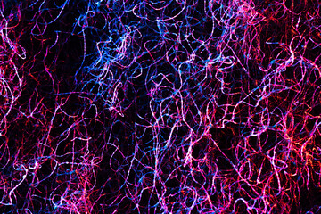 Wire abstract background. Green and red colors. No beggining or end. Made from wash cloth