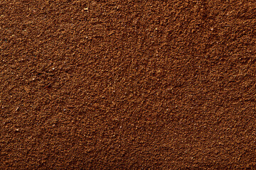 Ground coffee macro. Background of ground coffee texture. Food background