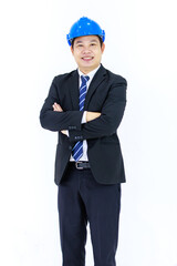 Isolated cutout full body studio shot of Millennial Asian successful professional male engineer in formal business suit safety helmet standing posing on white background