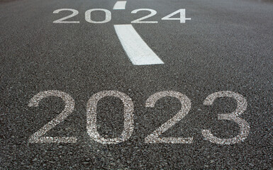 Years written on asphalt road.New year concept.